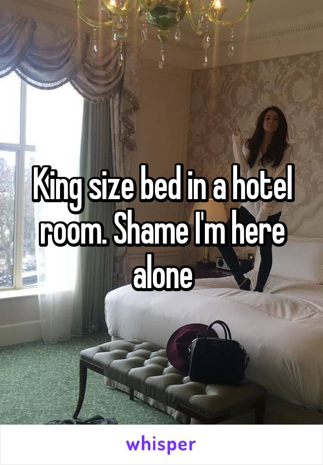 King size bed in a hotel room. Shame I'm here alone