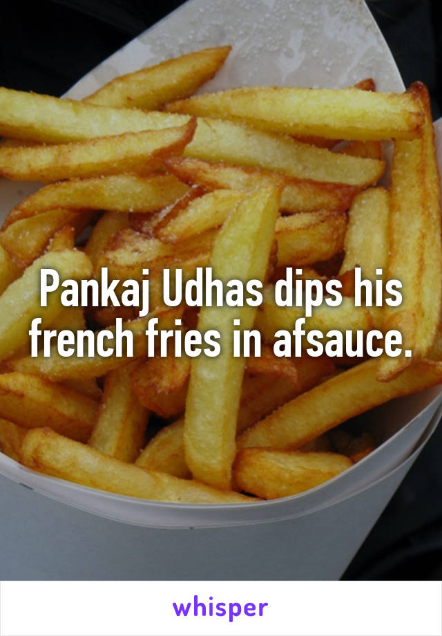 Pankaj Udhas dips his french fries in afsauce.