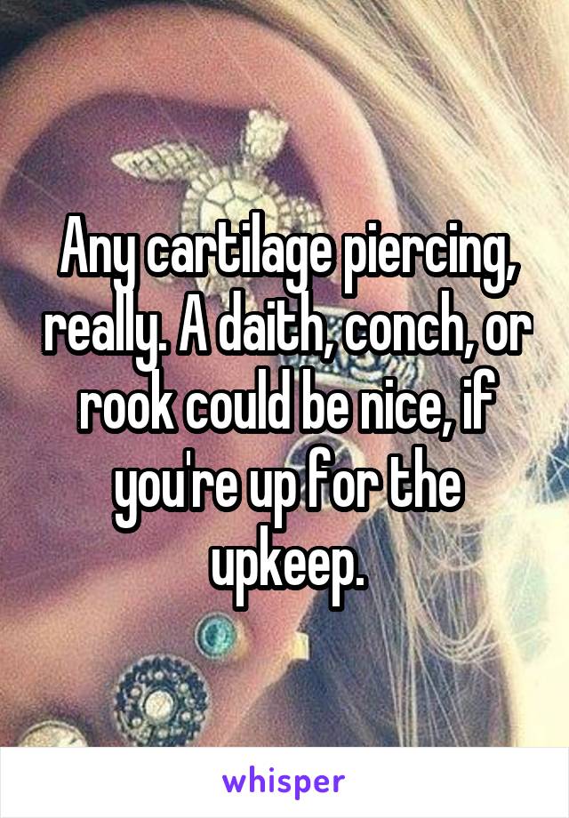 Any cartilage piercing, really. A daith, conch, or rook could be nice, if you're up for the upkeep.