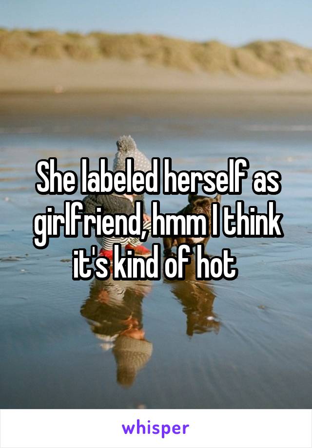 She labeled herself as girlfriend, hmm I think it's kind of hot 