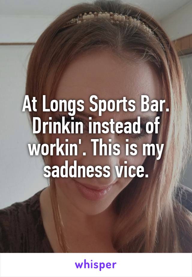 At Longs Sports Bar. Drinkin instead of workin'. This is my saddness vice.
