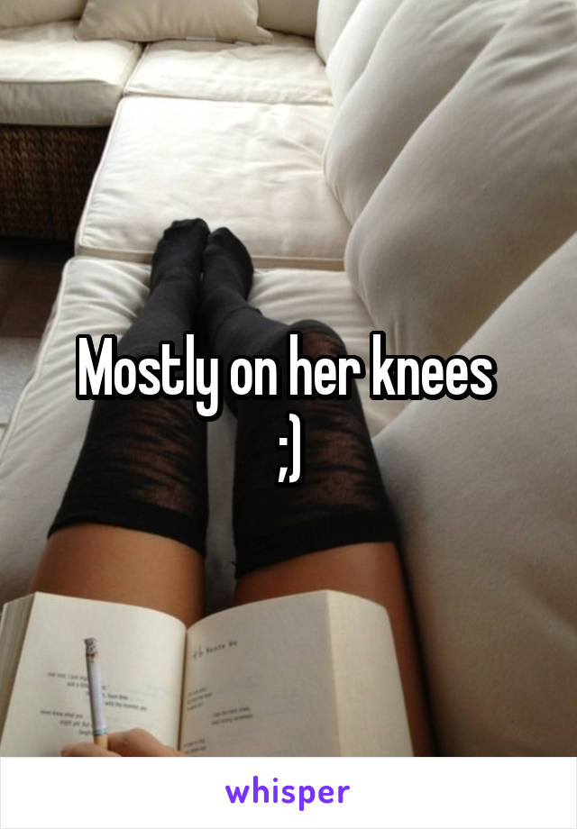 Mostly on her knees 
;)