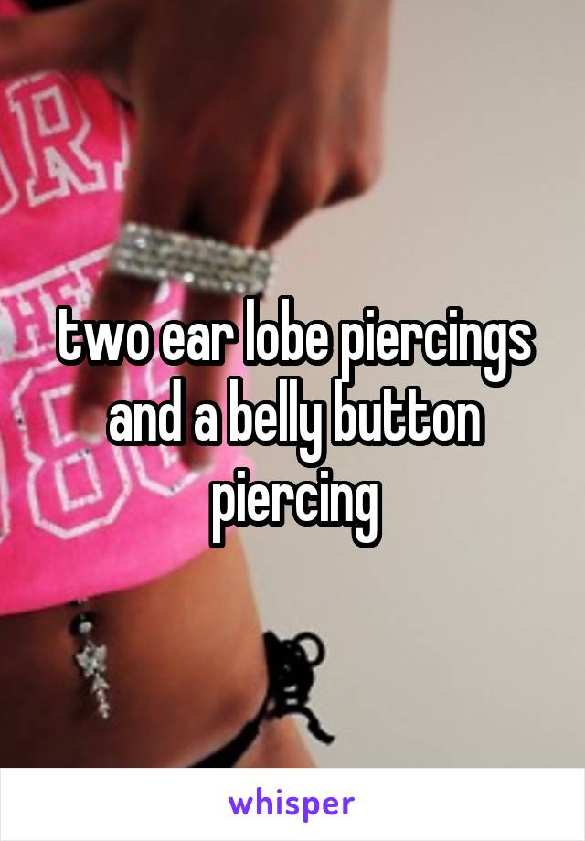 two ear lobe piercings and a belly button piercing