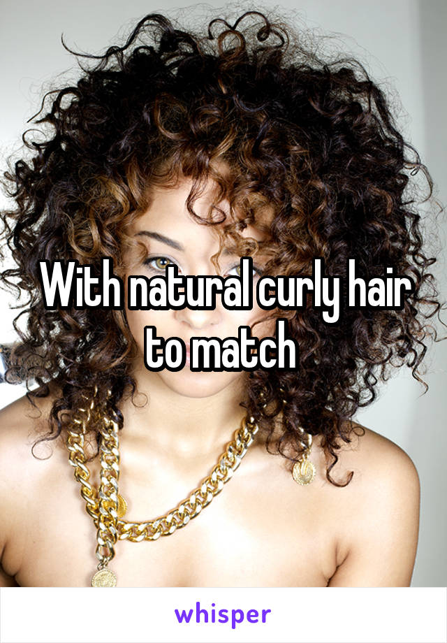 With natural curly hair to match 