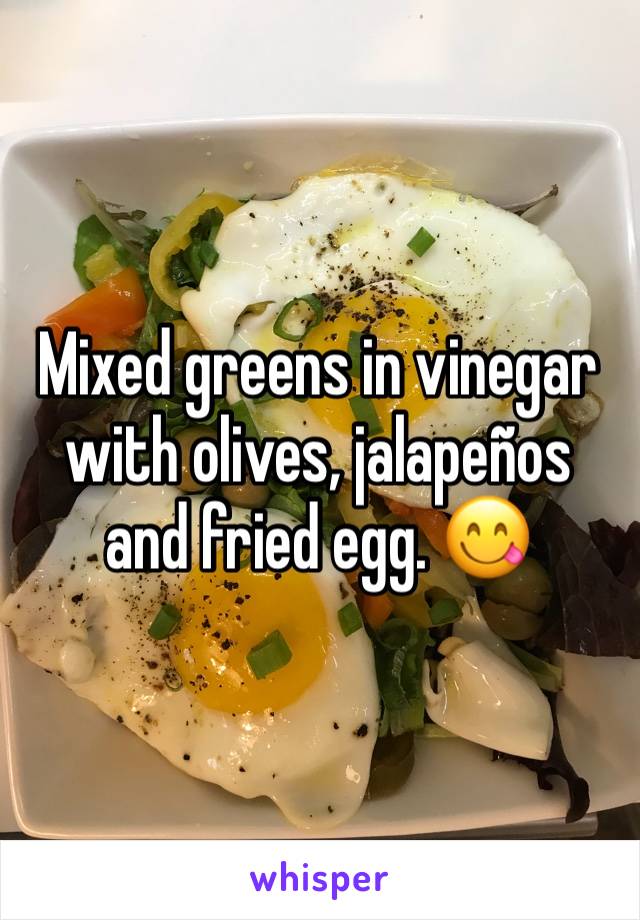 Mixed greens in vinegar with olives, jalapeños and fried egg. 😋