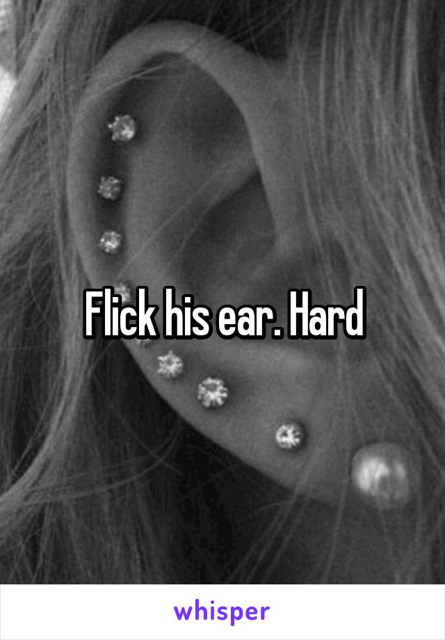 Flick his ear. Hard