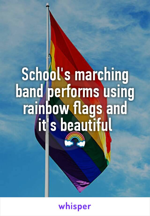 School's marching band performs using rainbow flags and
it's beautiful
🌈