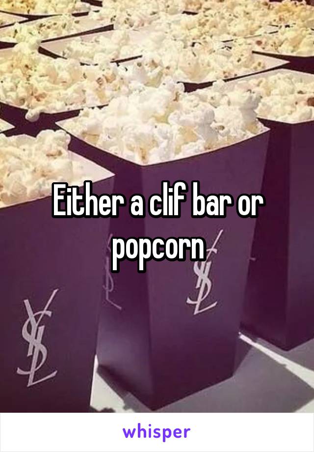 Either a clif bar or popcorn