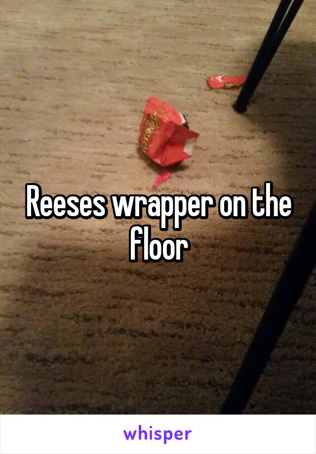 Reeses wrapper on the floor