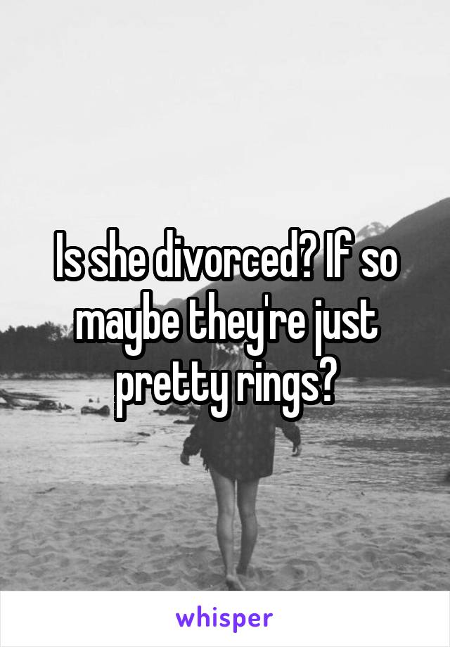 Is she divorced? If so maybe they're just pretty rings?