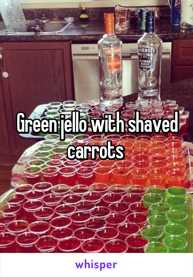 Green jello with shaved carrots 