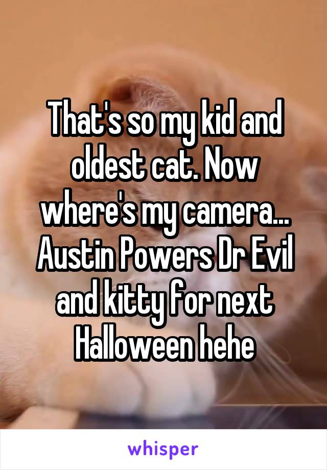 That's so my kid and oldest cat. Now where's my camera... Austin Powers Dr Evil and kitty for next Halloween hehe