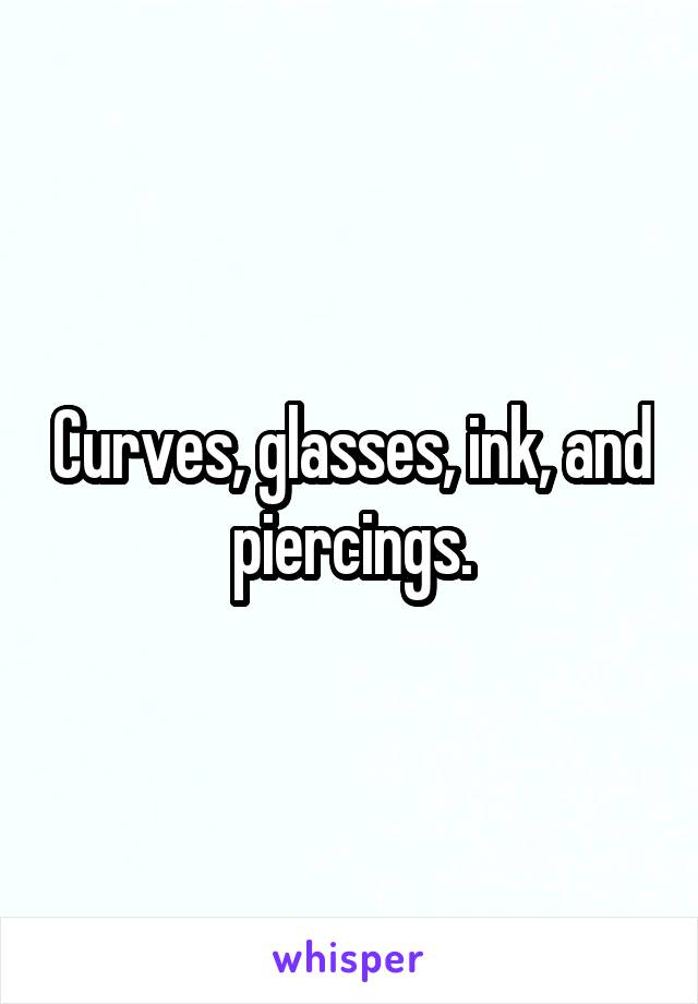 Curves, glasses, ink, and piercings.