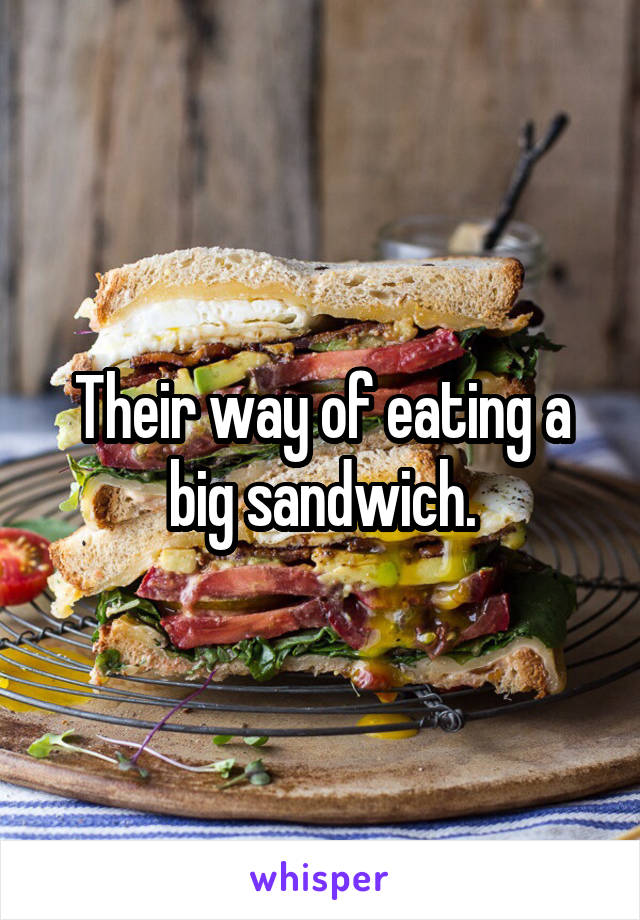 Their way of eating a big sandwich.