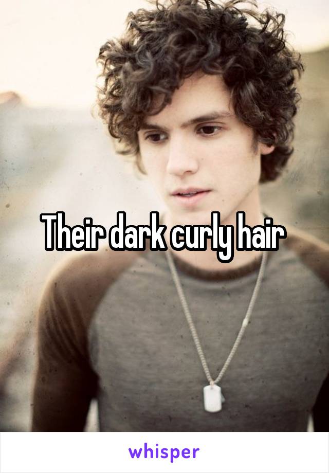 Their dark curly hair 