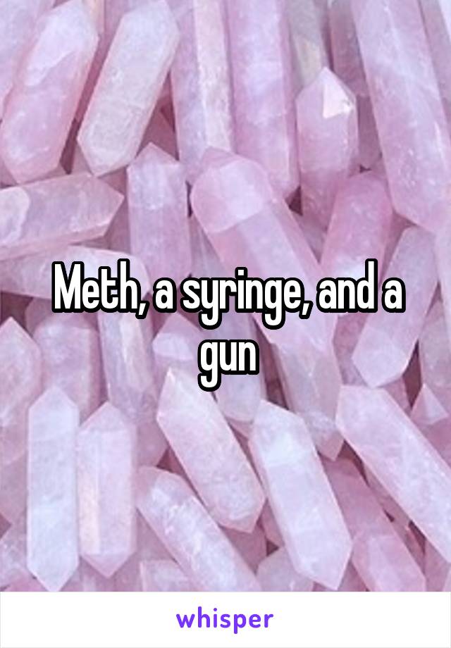 Meth, a syringe, and a gun
