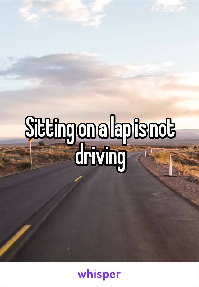 Sitting on a lap is not driving