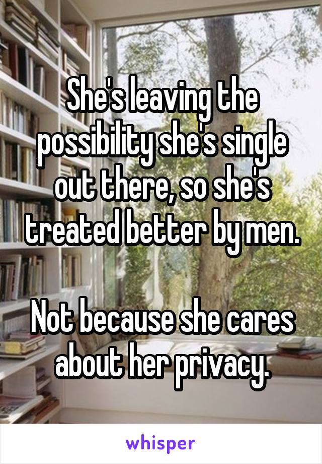 She's leaving the possibility she's single out there, so she's treated better by men.

Not because she cares about her privacy.