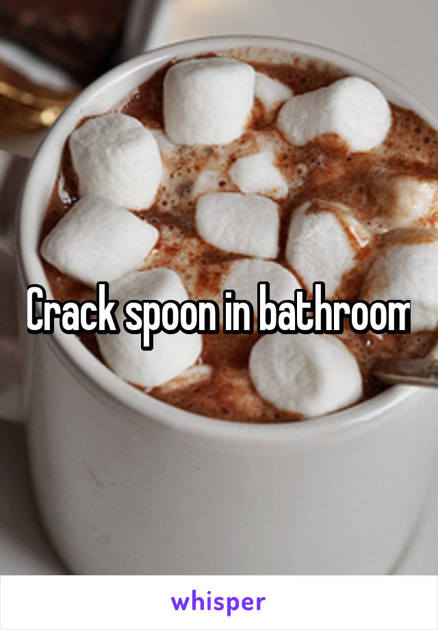 Crack spoon in bathroom