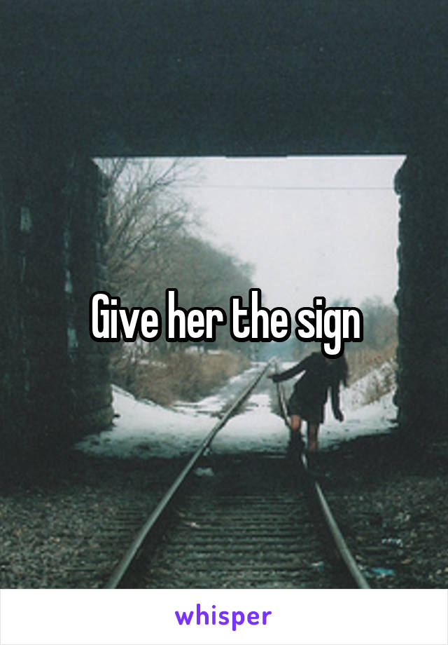 Give her the sign