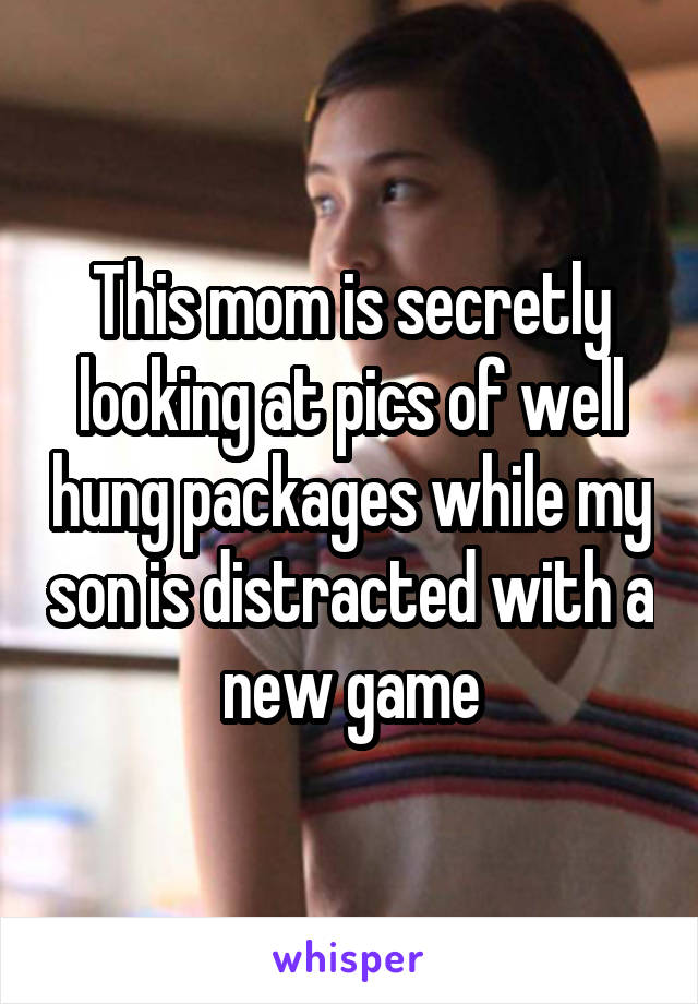 This mom is secretly looking at pics of well hung packages while my son is distracted with a new game