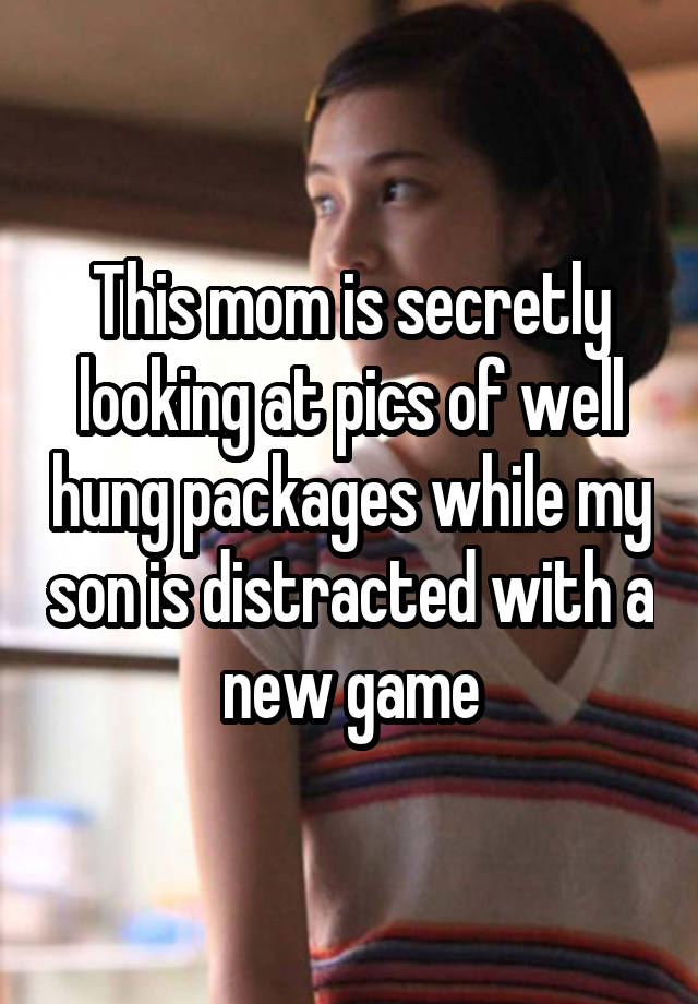 This mom is secretly looking at pics of well hung packages while my son is distracted with a new game