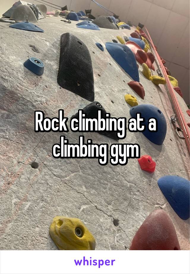 Rock climbing at a climbing gym