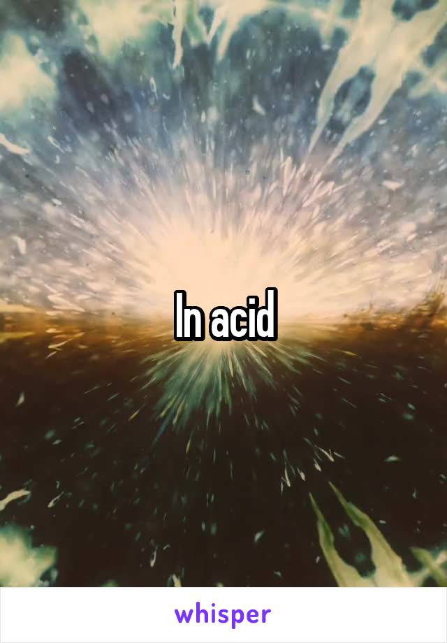 In acid